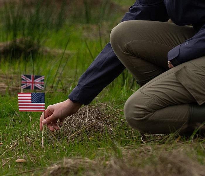planting a flag at friends of Laphroaig plot