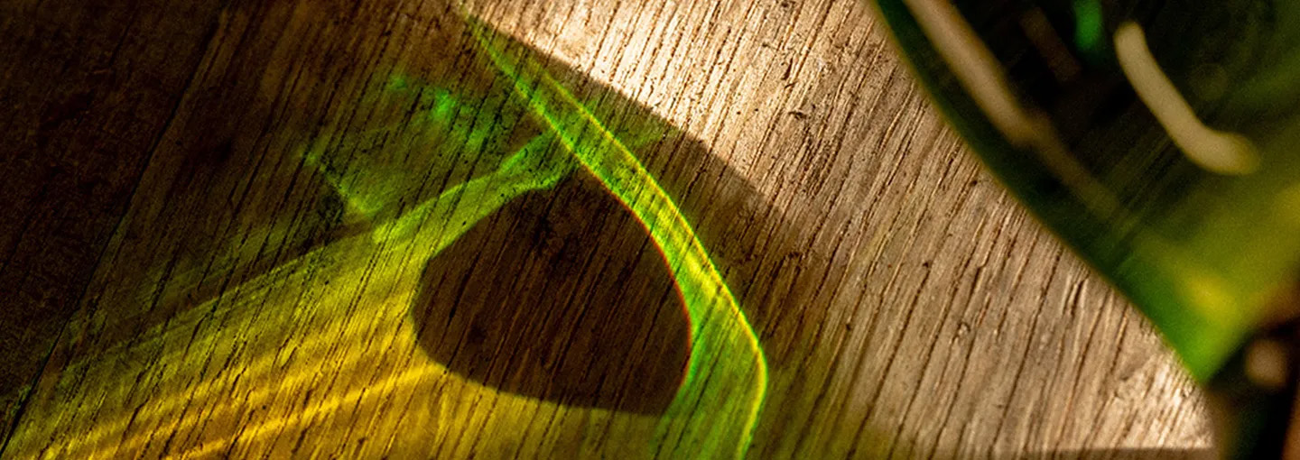 Whisky Bottle Reflection Light Wooden Surface Abstract Detail Laphroaig