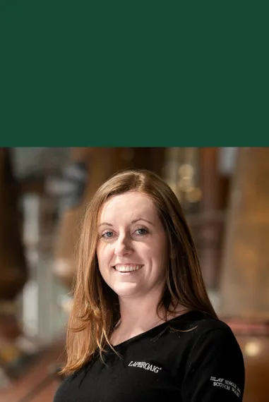 Pamela Ferguson standing in the distillery