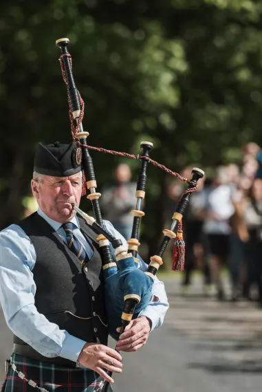 man playing instrument