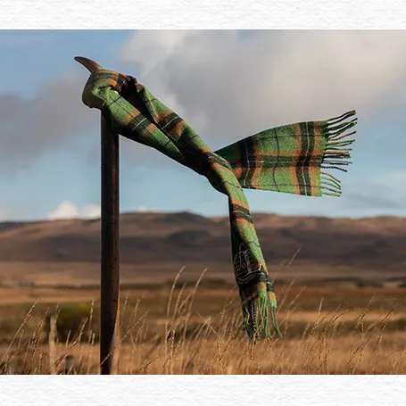 Laphroaig whisky merchandise scarf hanging on a pole