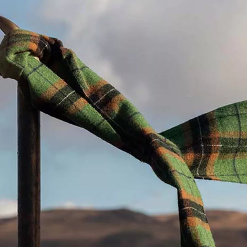 Image of Laphroaig whisky with Clothing merchandise consisting of labelled scarf.