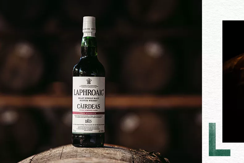 Laphroaig bottle standing on a barrel