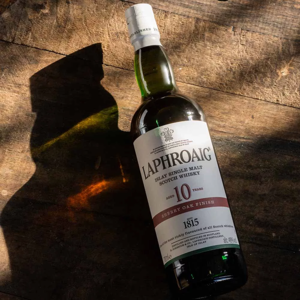 Laphroaig 10 Sherry Oak in front of a wooden background