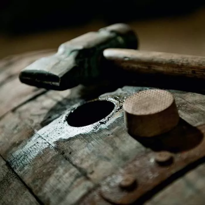 Laphroaig Port Wood barrel with a hammer on top
