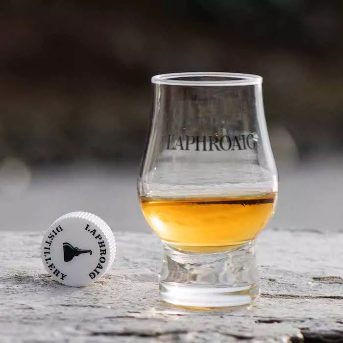 Laphroaig single malt whisky dram in a glass outdoors