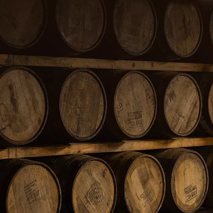 Laphroaig Cairdeas Warehouse 1 stacked up barrels
