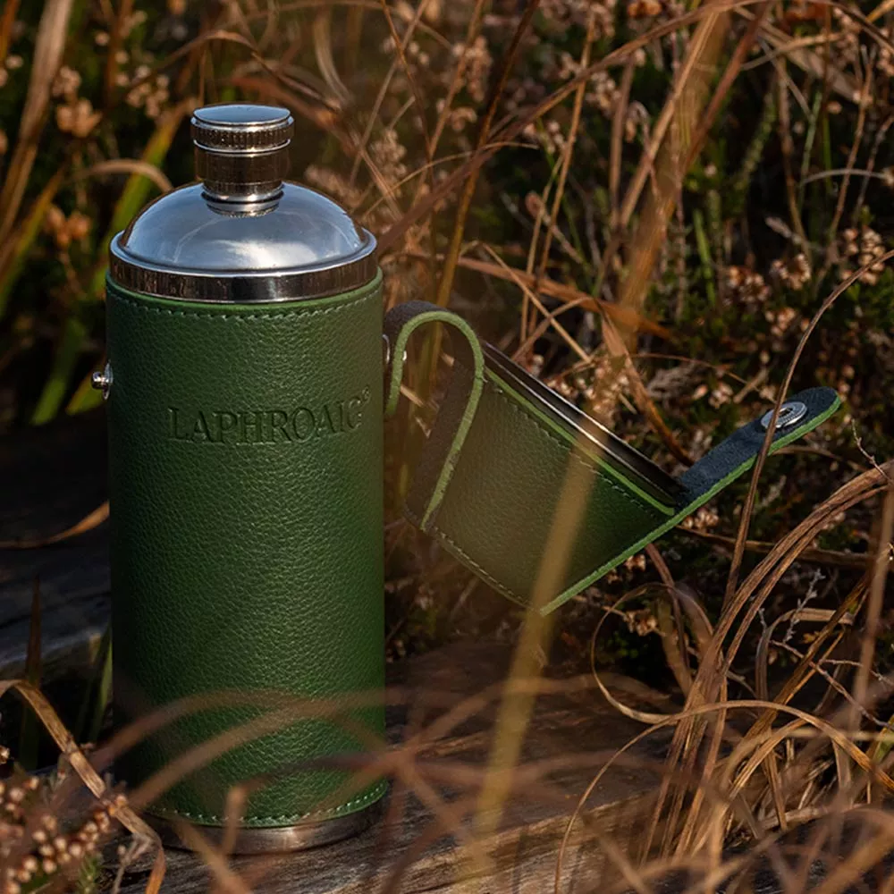 Laphroaig Hip Flask in a field