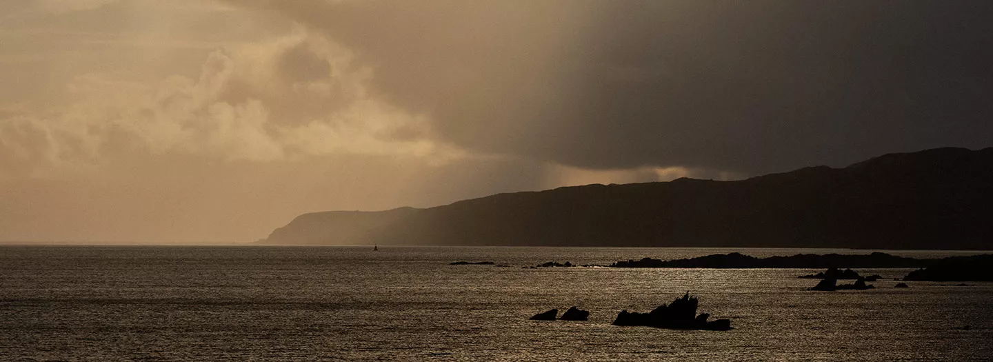 Picture of the Islay shore with a Sepia filter for a vintage feel of Laphroaig's whisky heritage