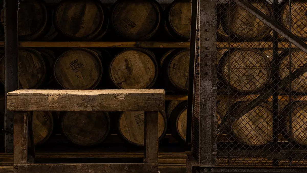 Laphroaig wooden warehouse with barrels of whisky maturing