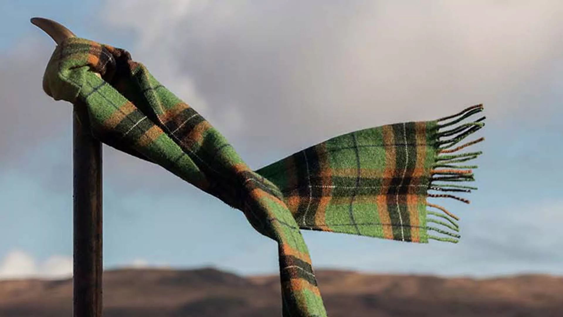 Image of Laphroaig whisky with Clothing merchandise consisting of labelled scarf.