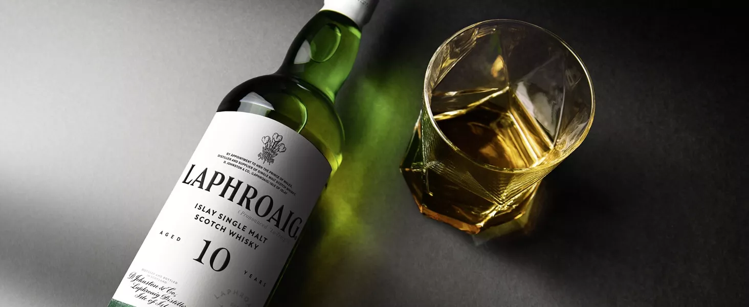 Bottle of 10 Year old Laphroaig and glass filled with it