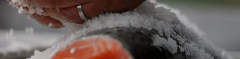 Taste trailblazers preparing fish with salt