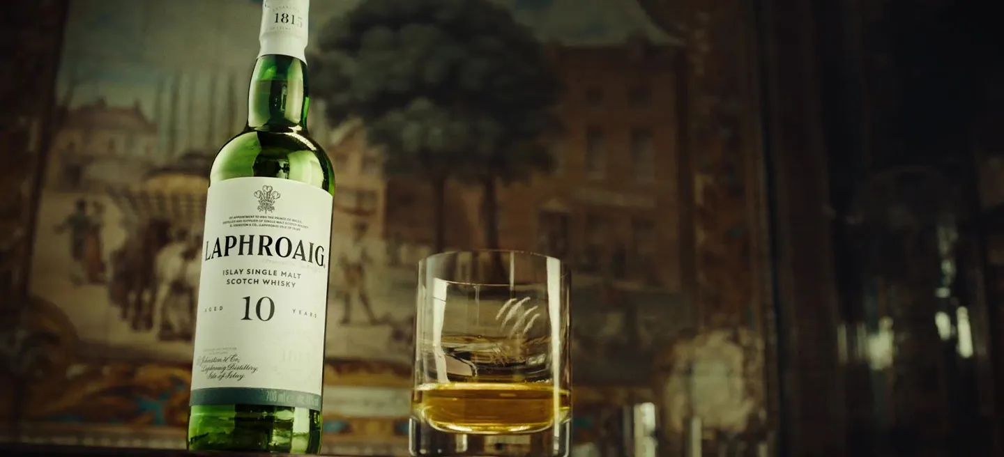 Laphroaig 10 Year Old bottle with whisky in glass