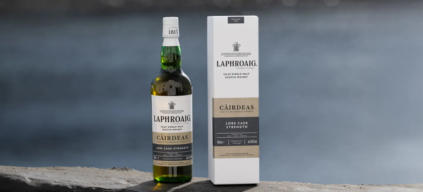 Lore Cairdeas 2025 bottle and box on distillery wall