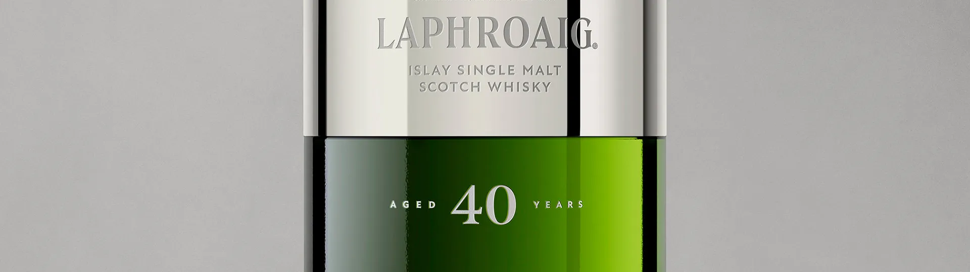 Zoomed in shot of the Laphroaig Capsule bottle with the Laphroaig logo and aged 40 years age statement