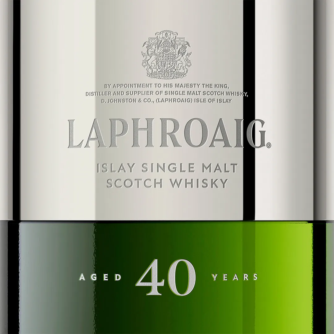 Detail of the decanter design focusing on logo and age statement