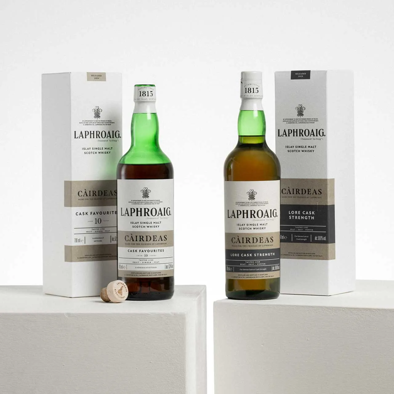 Càirdeas Set featuring Laphroaig Càirdeas 2024 Cask Favourites and Càirdeas 2025 Lore Cask Strength with presentation boxes.