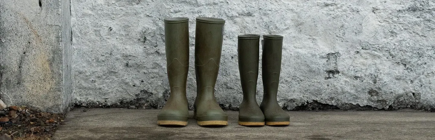 Distillery Rubber Boots Pair Concrete Floor White Wall Laphroaig