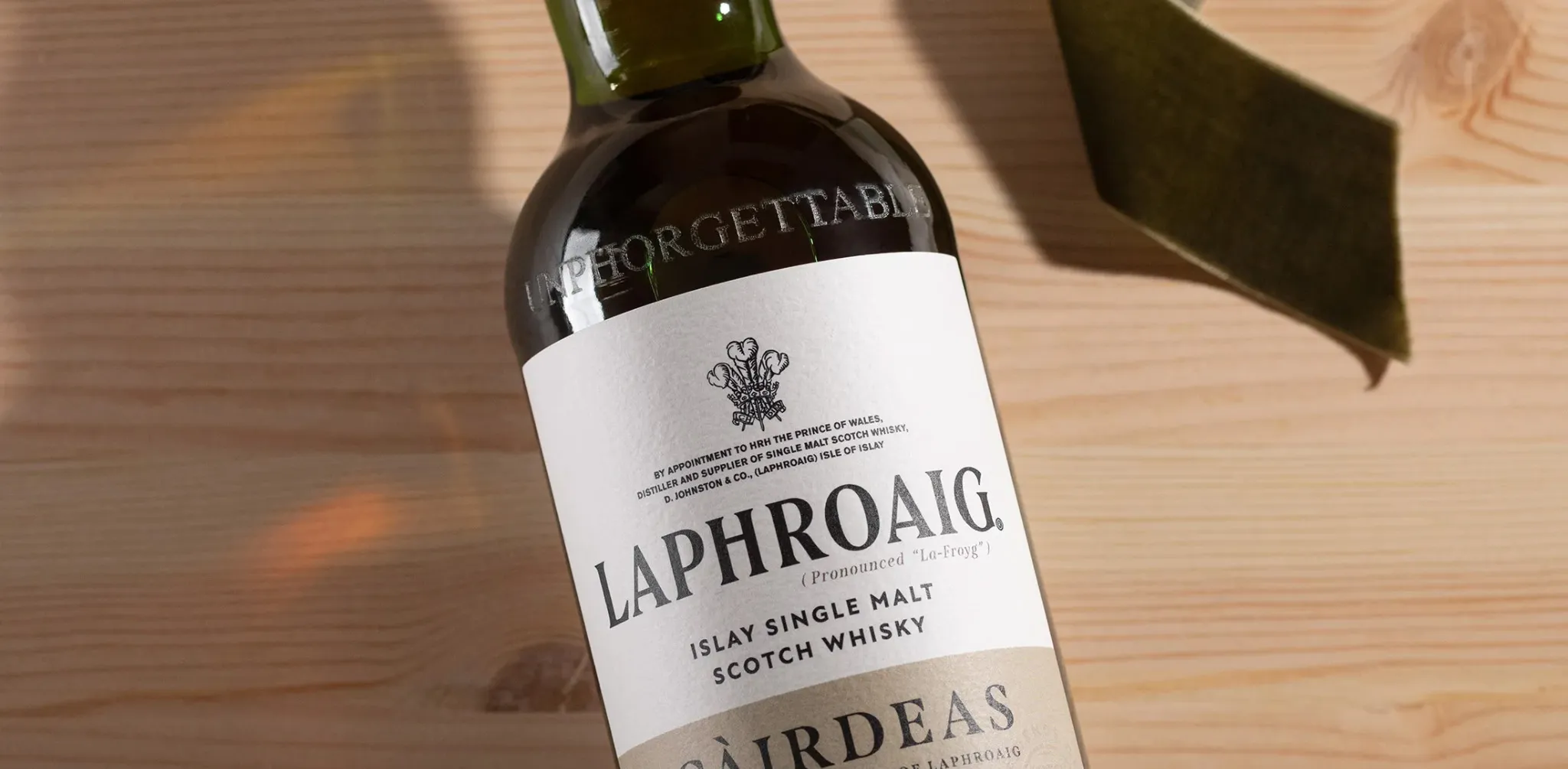Single Malt Whisky Bottle Cairdeas Label Wooden Surface Detail Laphroaig