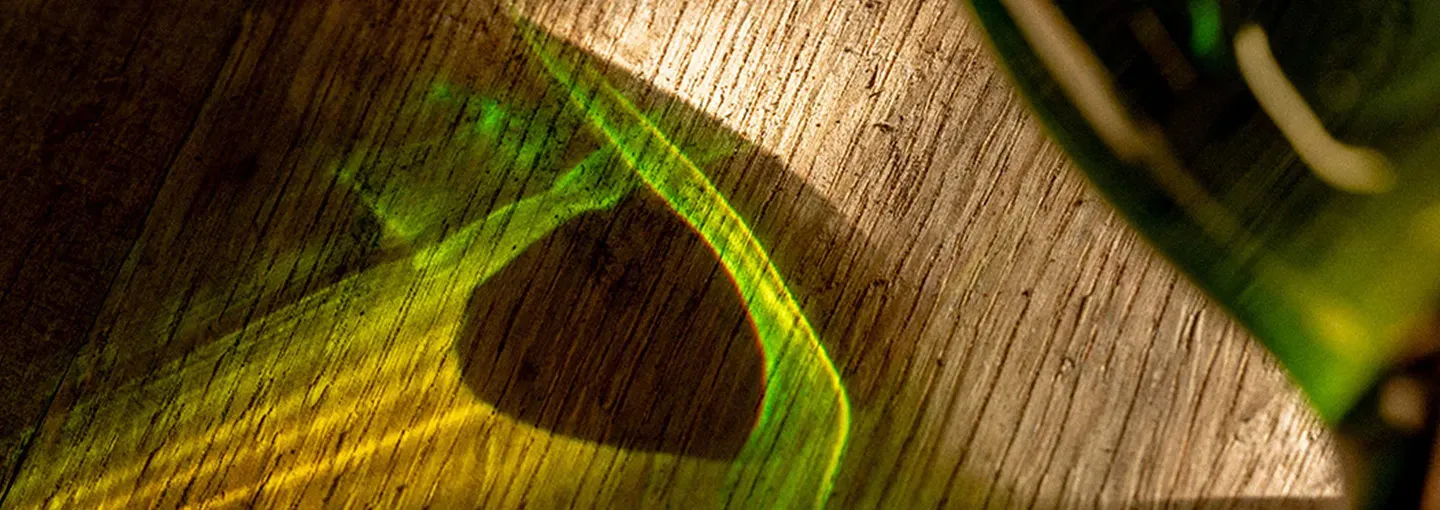 Whisky Bottle Reflection Light Wooden Surface Abstract Detail Laphroaig
