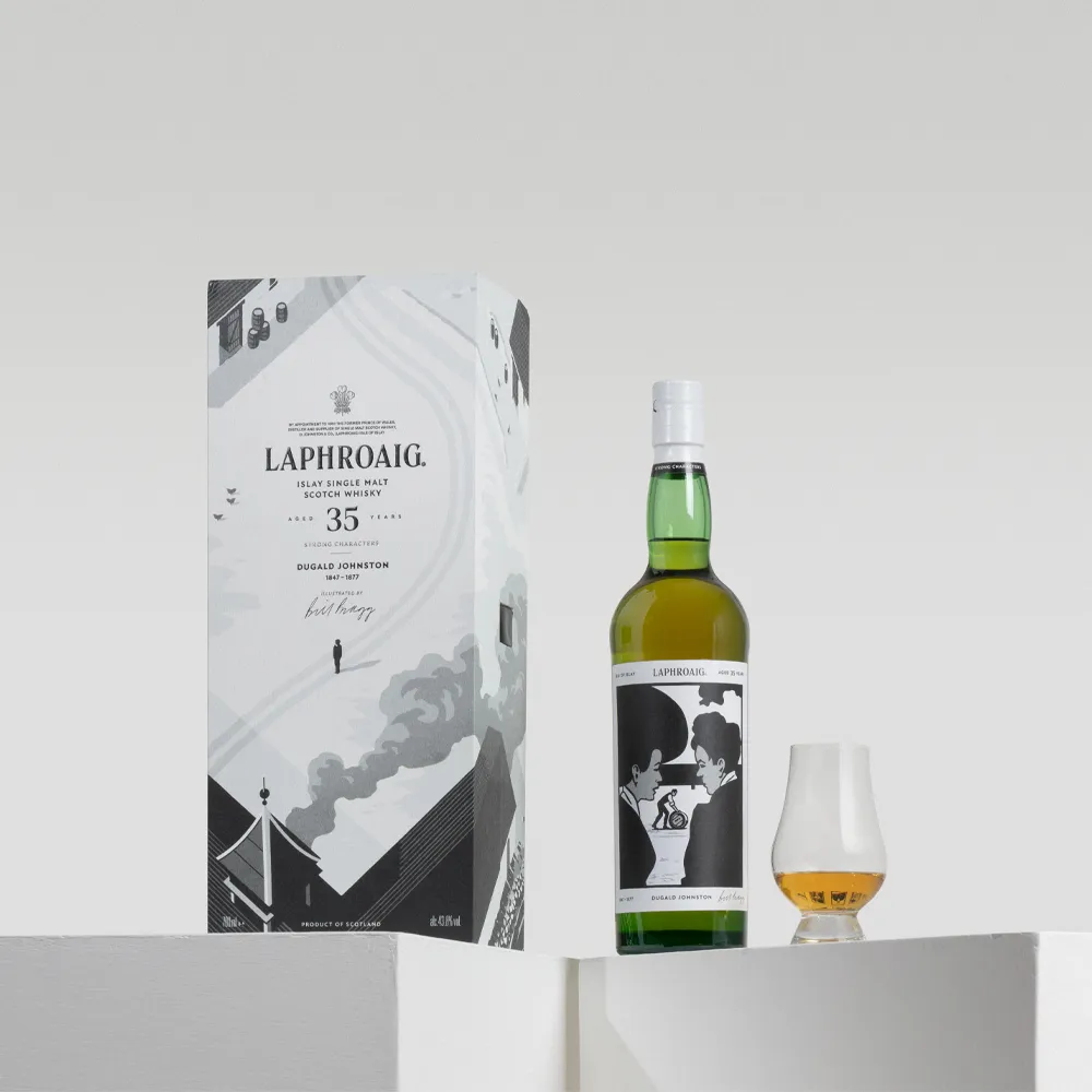 Laphroaig Strong Characters Chapter 2 35-Year-Old whisky, shown with its illustrated presentation box and a tasting glass of whisky.
